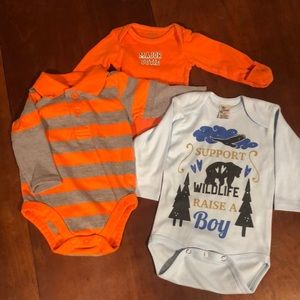 3 baby boys size 0-3 months and 1 newborn long sleeves onesies